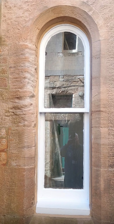 Traditional sash and case window with renewed sand mastic perimeter seal