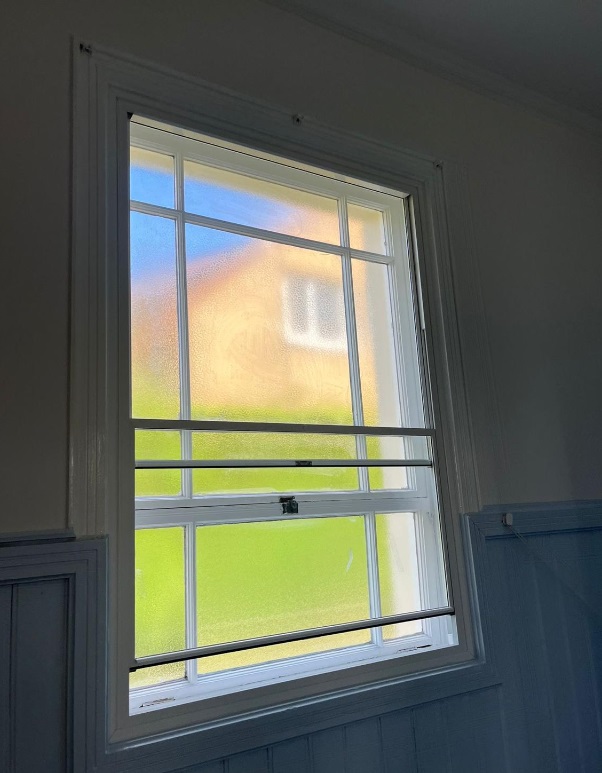 Secondary glazing fitted internally to a traditional sash and case window